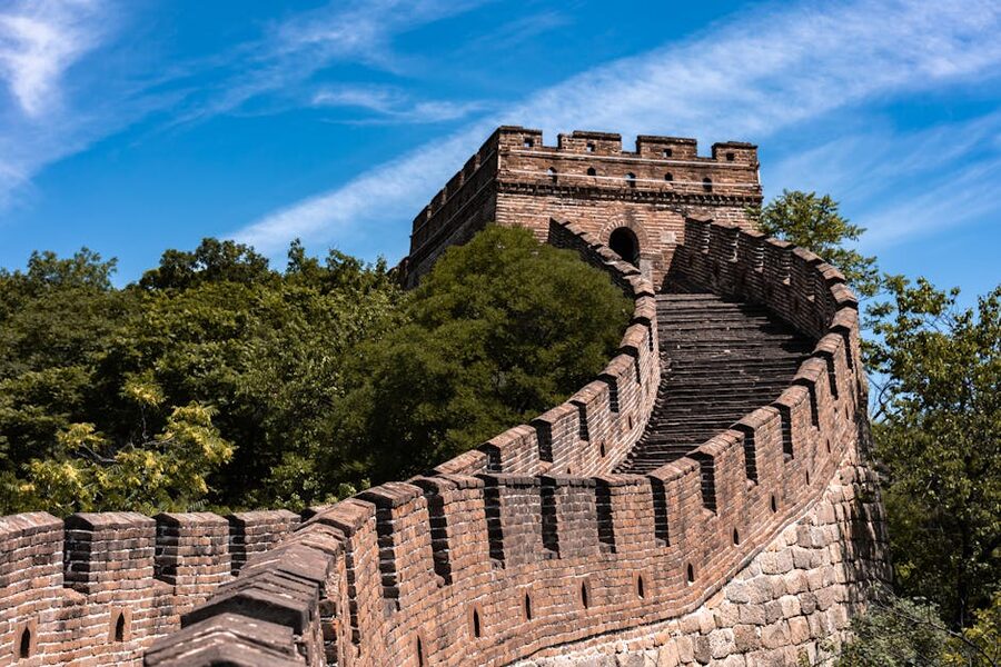 Stone stairs climbing to a Great Wall watchtower at Mutianyu