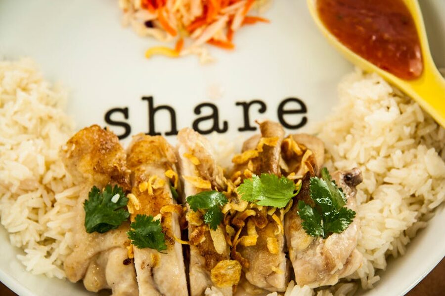 Khao man gai Thai chicken rice with herbs