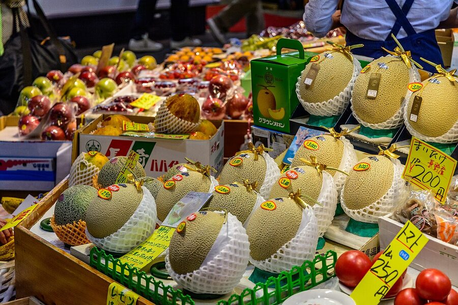 Inside Omicho Market in Kanazawa, vendors selling fresh seafood