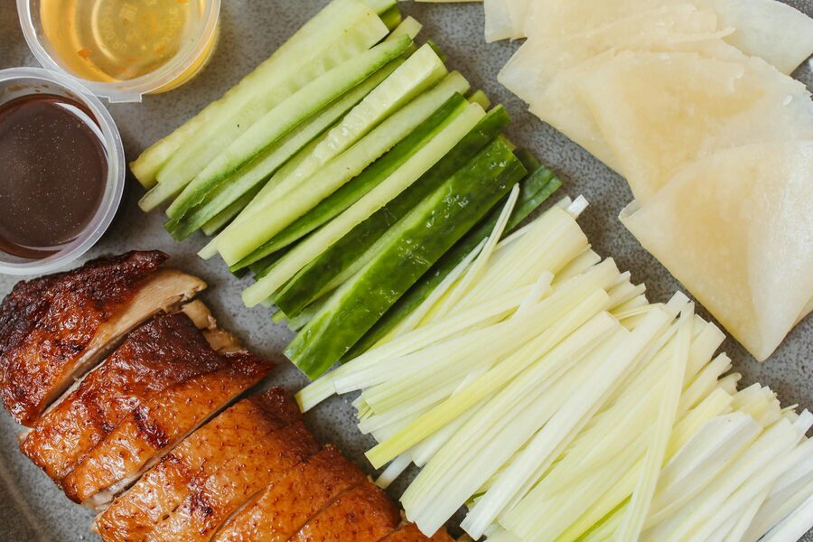 Peking duck with cucumber, onion and hoisin sauce viewed from above