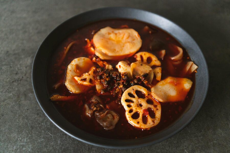 Sichuan hotpot with lotus roots, potatoes and red chilli broth
