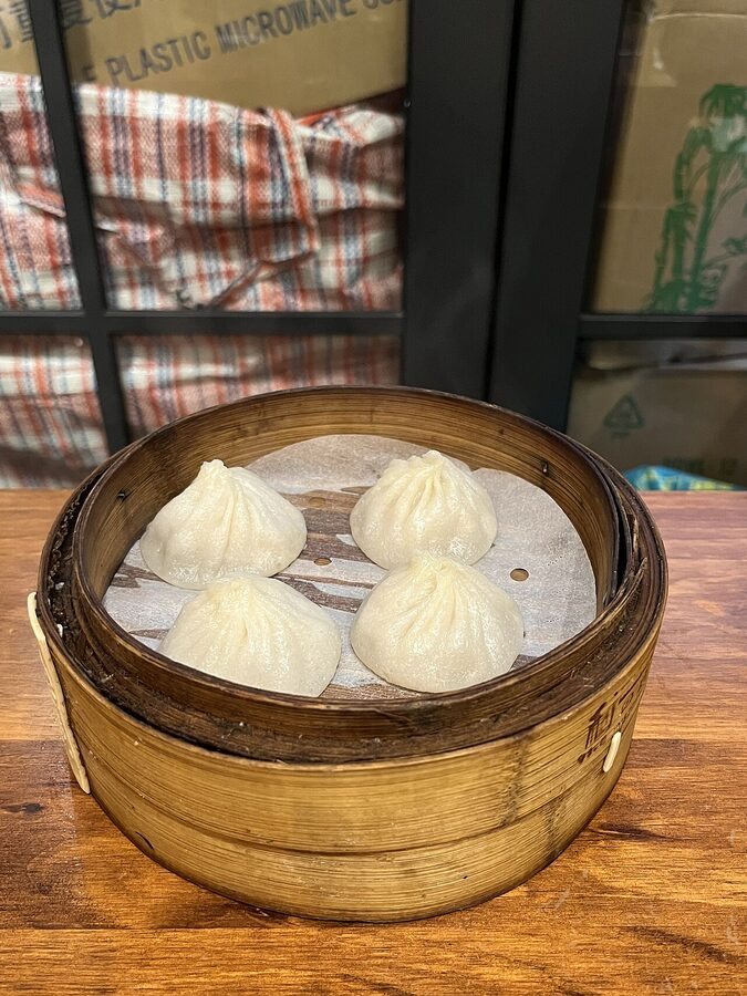 Xiao long bao Shanghai soup dumplings in a bamboo steamer