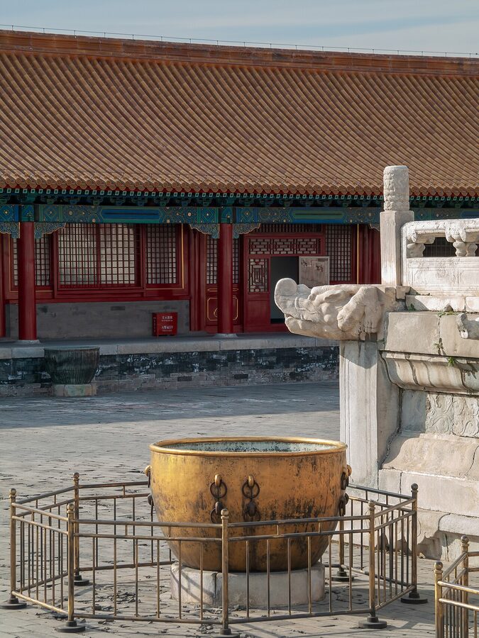 Large bronze water vessel placed in front of a hall in the Forbidden City, Beijing