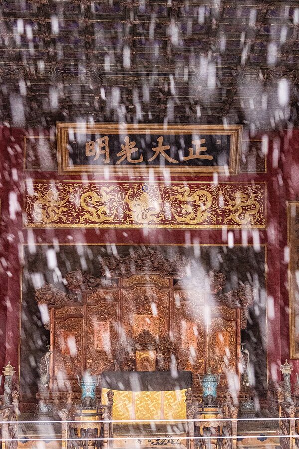 Throne in the Palace of Heavenly Purity behind falling snow