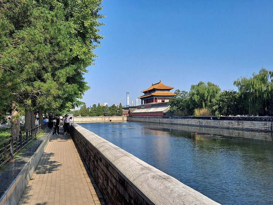 Forbidden City moat with reflection of palace walls