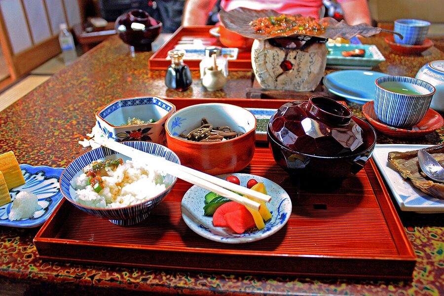 Japanese ryokan breakfast tray with rice, miso soup, fish and pickles