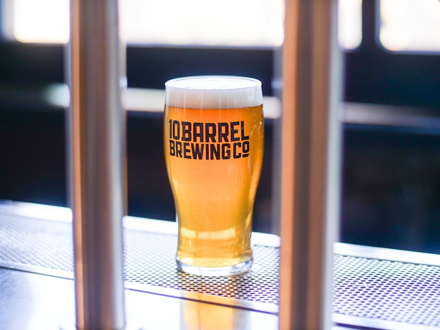 Chilled pint of craft beer with foam