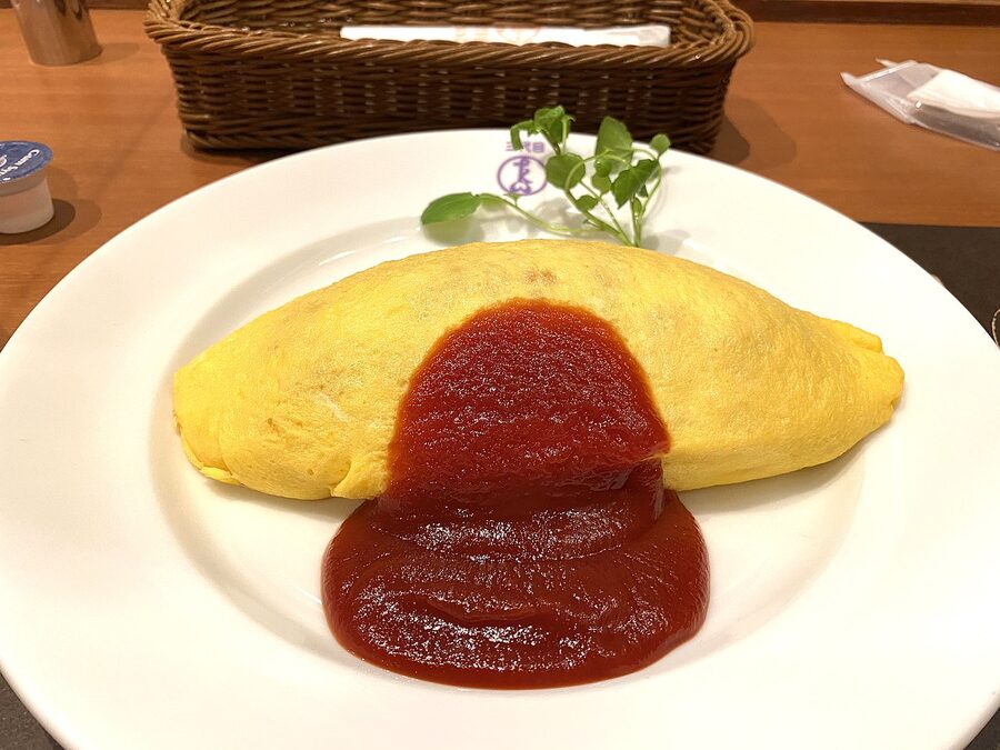 Omurice with thin omelette over fried rice