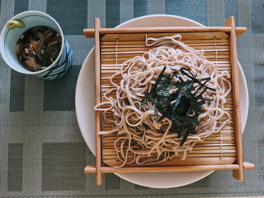 Cold zaru soba noodles on a bamboo mat