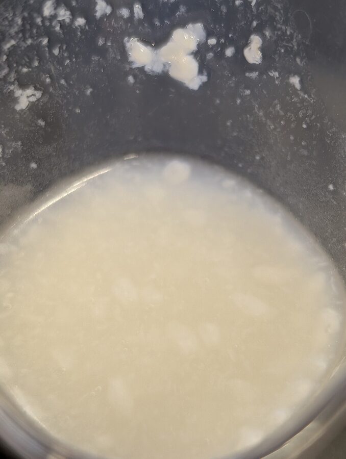 Clear nihonshu sake served in a small ceramic cup, Nagano-style nama-zake