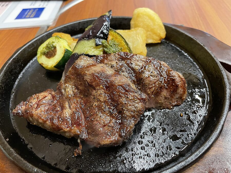 A sliced Yonezawa beef steak served with garnish
