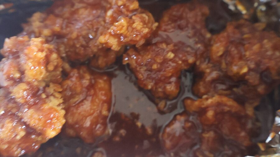 Yangnyeom Korean fried chicken glazed in red sweet and spicy sauce