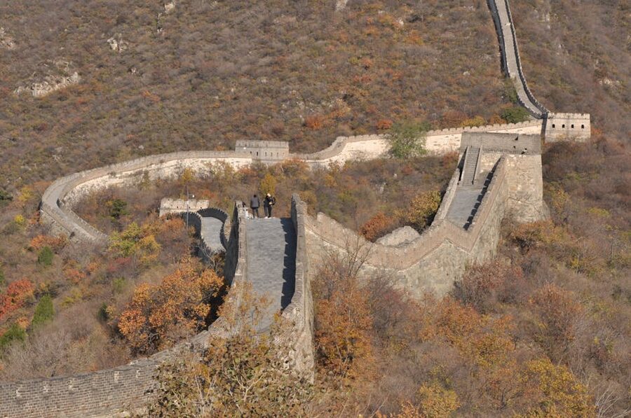 Aerial view of the Great Wall of China with autumn foliage