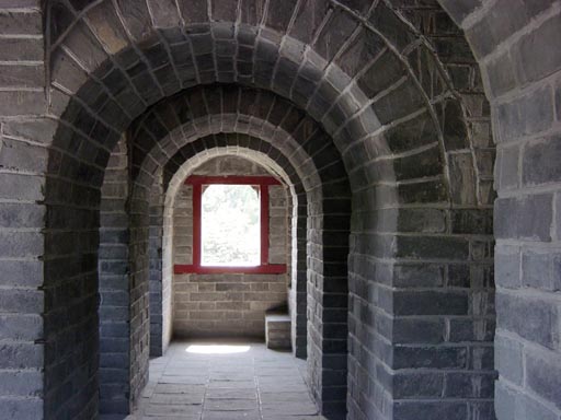 Inside a Great Wall watchtower with brick arches