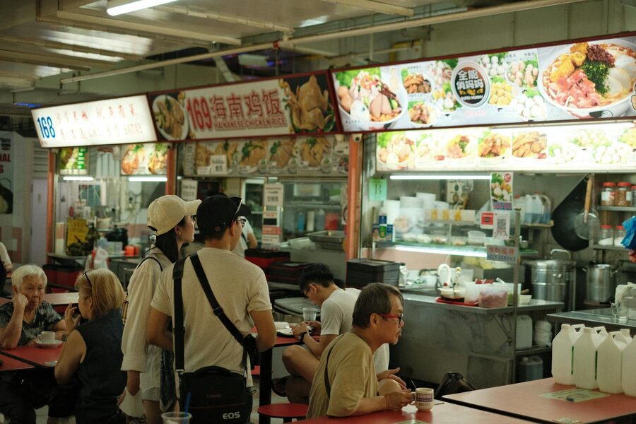 Diners at a Singaporean hawker centre enjoying food