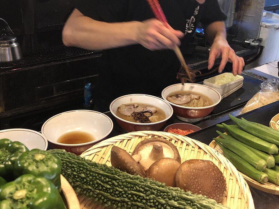 Hakata ramen preparation at a Yatai Keiji stall