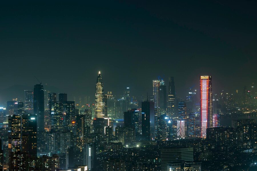 Shenzhen skyline at night with illuminated skyscrapers