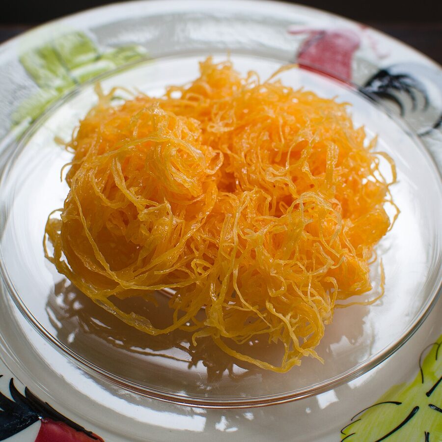 Foi thong, Thai dessert of golden egg yolk threads in jasmine syrup