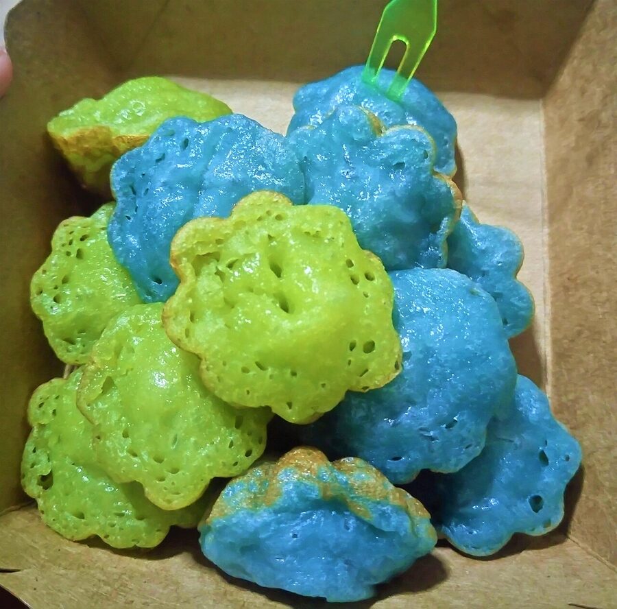 Khanom krok flavoured with pandan and butterfly pea flower