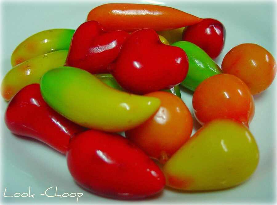 Colourful luk chup Thai mung bean sweets in assorted fruit shapes