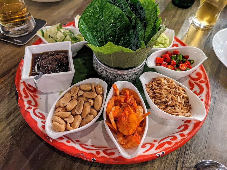 Miang kham betel leaf platter with Thai ingredients