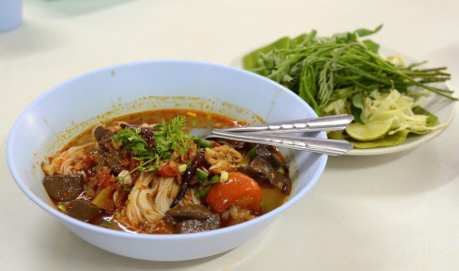 Kanom chin nam ngiao fermented noodles with pork blood tomato broth