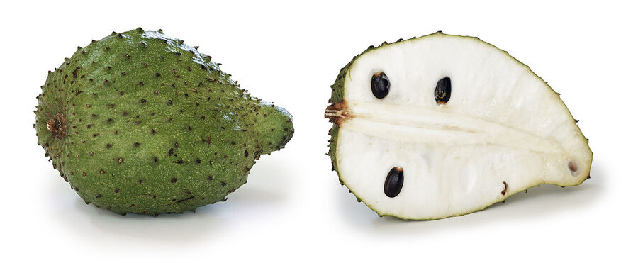 Soursop fruit opened showing white flesh