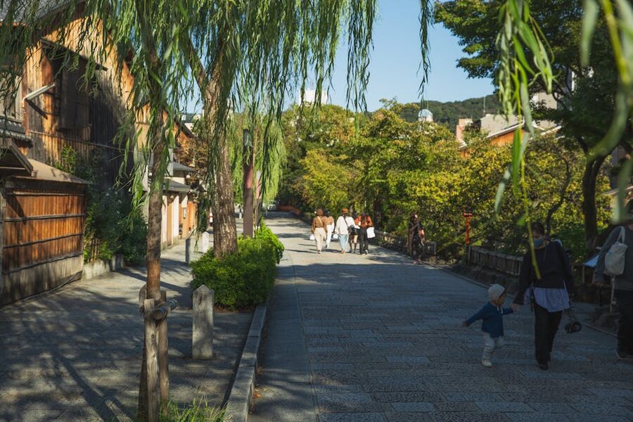 Shinbashi Dori street in Gion, Kyoto, lined with wooden machiya houses