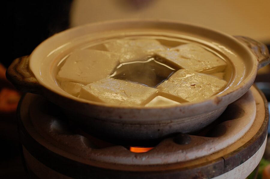 Yudofu tofu hotpot simmering in a donabe pot in Kyoto