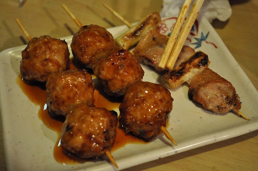 Kushiyaki spread of tsukune, scallion and pork belly