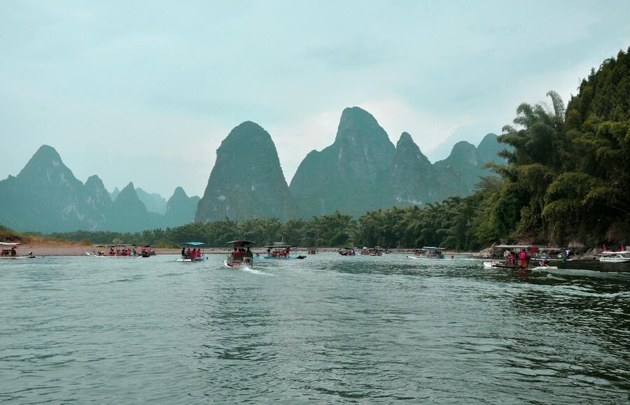 Li River with karst backdrop and bamboo boats