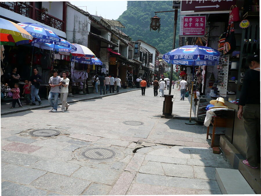 West Street Yangshuo at night with lanterns and shops